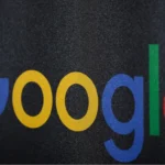 Smartphone with Google Assistant active and privacy warning icons, representing the voice assistant recording lawsuit settlement.