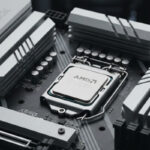 Close-up of an ASRock motherboard with an AMD Ryzen X3D CPU installed, highlighting the motherboard components and CPU socket.