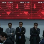 Pakistan Stocks Exchange trading floor showing falling stock prices and market volatility